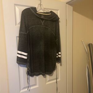 Gray Hooded Tee shirt with white striped sleeves.